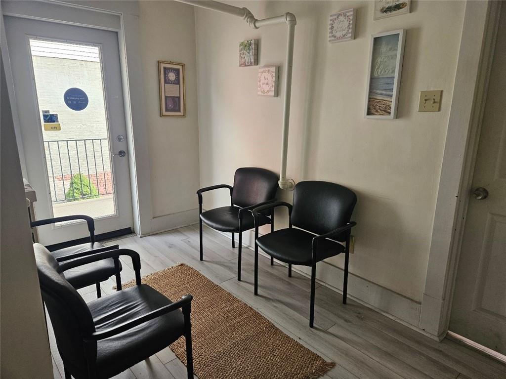 210 Bridge Street, Unit A Bridgewater, PA 15009 - Photo 5 of 5 a living room with furniture and a window