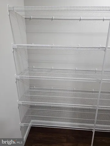 a view of a door with wooden floor