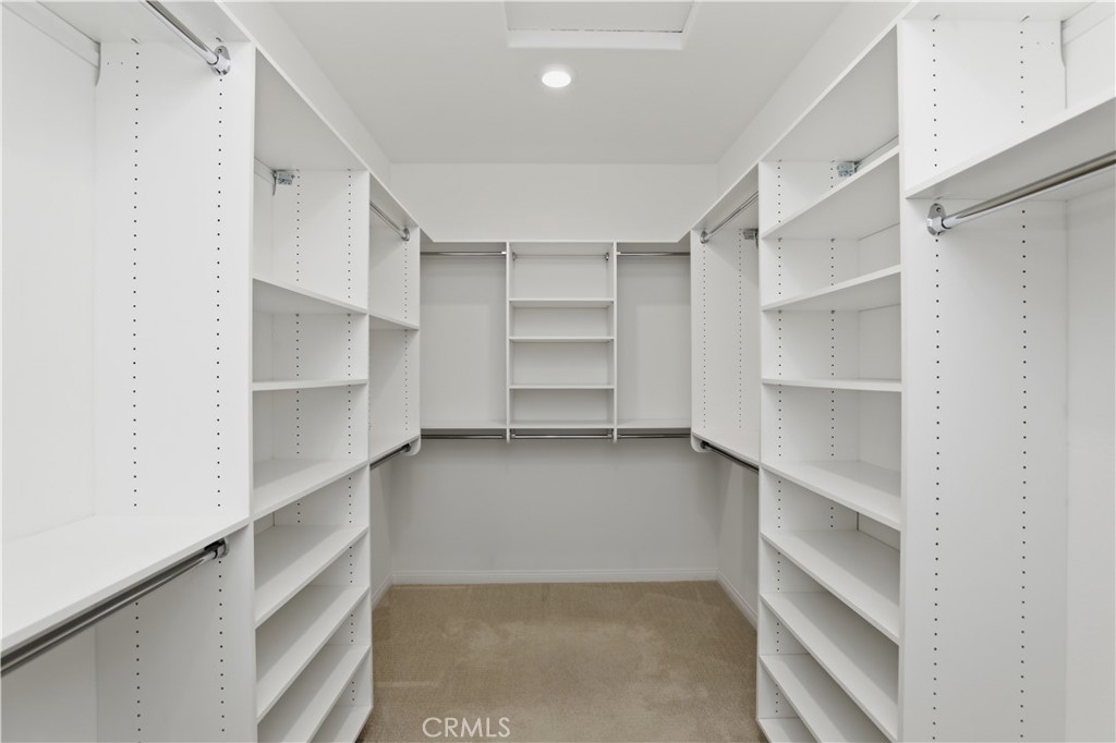 21159 Blue Jeans Court Riverside, CA 92507 - Photo 42 of 63 a view of walk in closet with empty racks