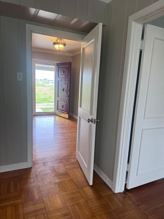626 Stiff Chapel Road Gunter, TX 75058 - Photo 18 of 40 a view of a hallway with wooden floor and closet