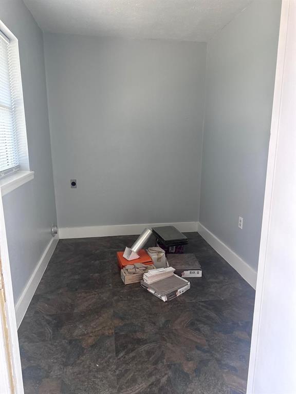 626 Stiff Chapel Road Gunter, TX 75058 - Photo 38 of 40 a room with wooden floor and window