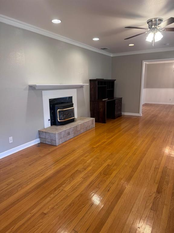 626 Stiff Chapel Road Gunter, TX 75058 - Photo 10 of 40 a view of empty room with wooden floor and fireplace