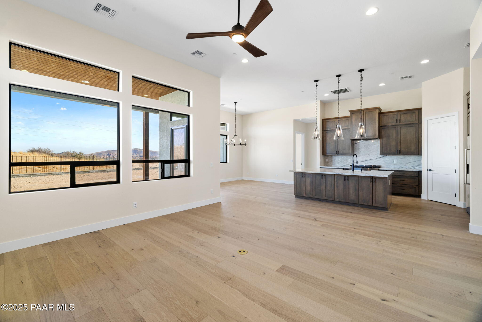 5649 Meridian Court Prescott, AZ 86305 - Photo 13 of 22 23-Living Room to Kitchen (1)