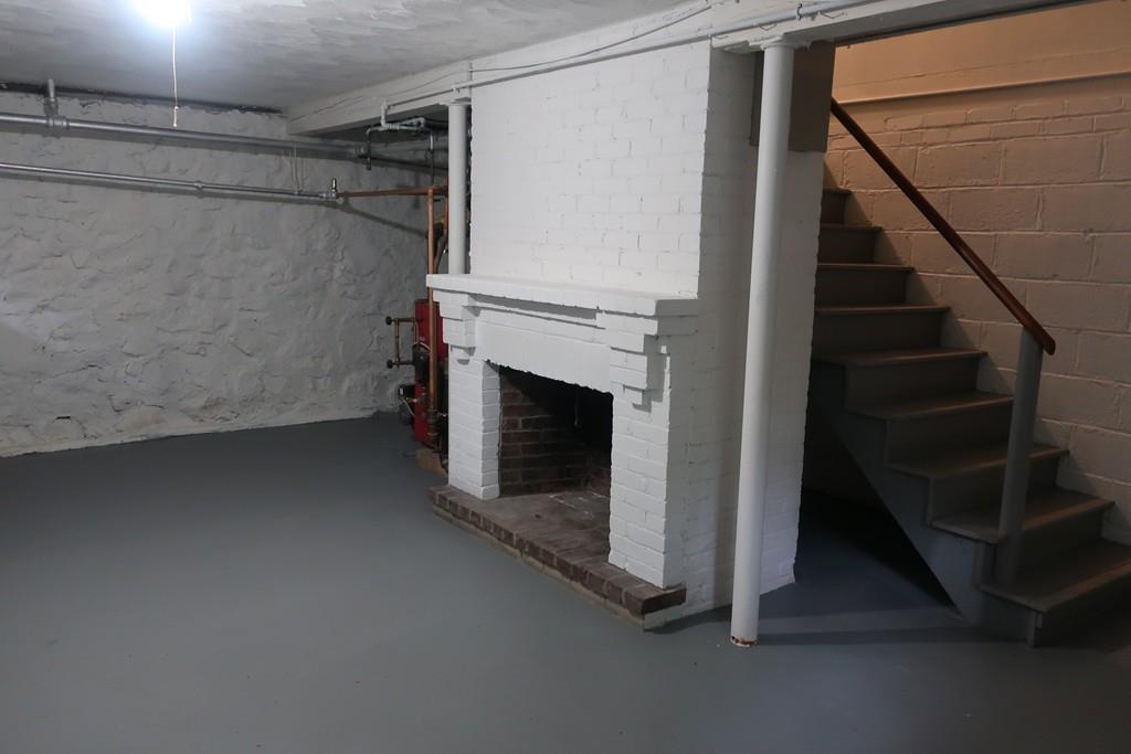 4 Payson Street Lexington, MA 02421 - Photo 17 of 22 a view of a room with stairs