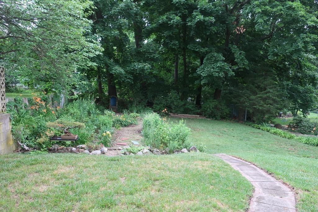 4 Payson Street Lexington, MA 02421 - Photo 20 of 22 a green field with lots of trees in it