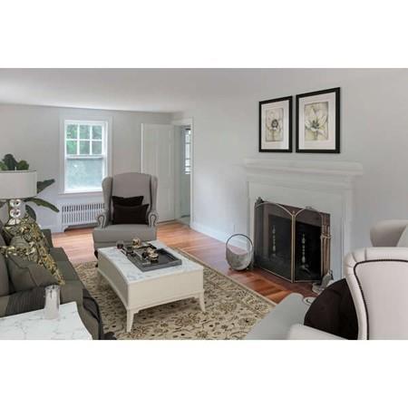 4 Payson Street Lexington, MA 02421 - Photo 2 of 22 a living room with furniture and a fireplace