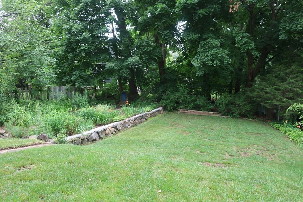 4 Payson Street Lexington, MA 02421 - Photo 21 of 22 a view of a green yard