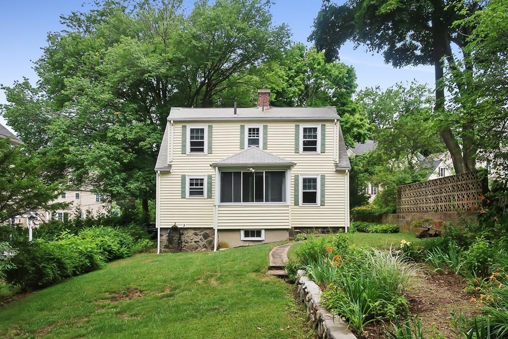 4 Payson Street Lexington, MA 02421 - Photo 22 of 22 a front view of a house with a garden