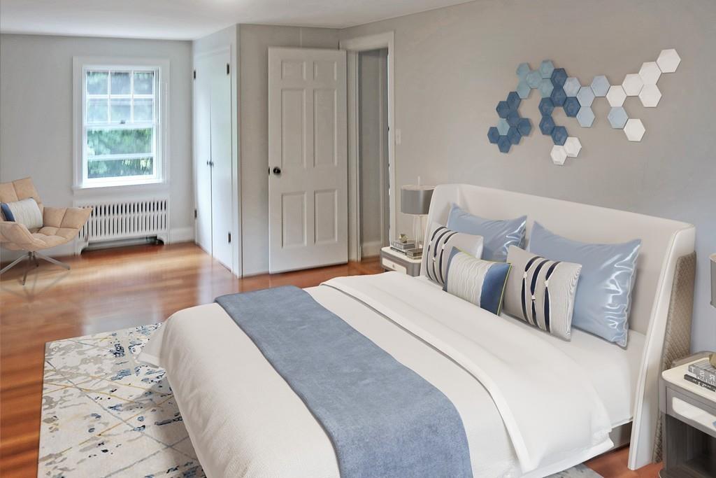4 Payson Street Lexington, MA 02421 - Photo 7 of 22 a spacious bedroom with a bed and a window
