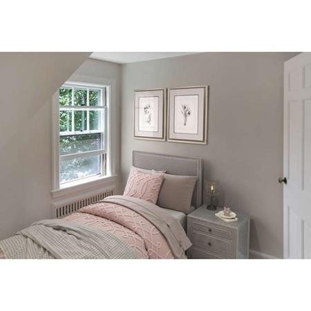 4 Payson Street Lexington, MA 02421 - Photo 9 of 22 a bedroom with a bed and a window
