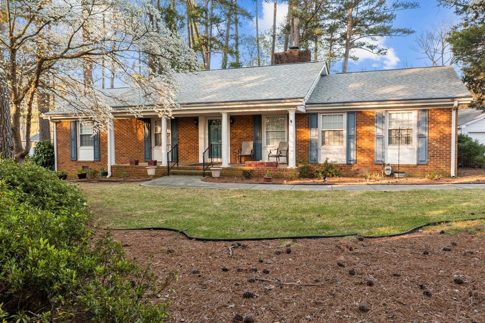 Welcome to 1208 Country Ridge Drive. Convenient to North Hills Shopping and Dining and access to I-440. Exterior Front