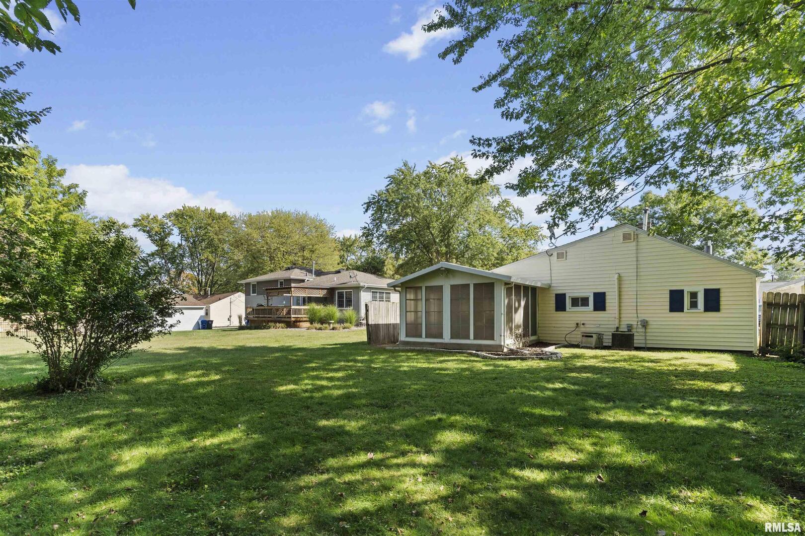 1501 43rd Street Moline, IL 61265 - Photo 18 of 27 a front view of house with yard and green space
