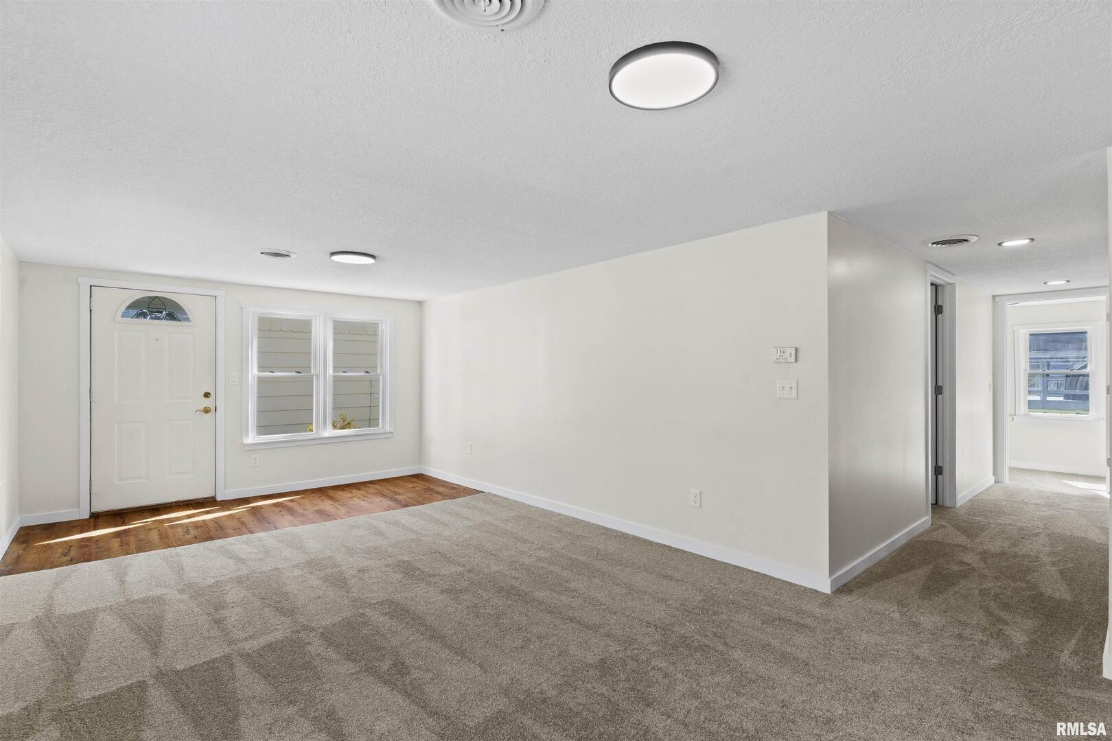 1501 43rd Street Moline, IL 61265 - Photo 20 of 27 an empty room with windows
