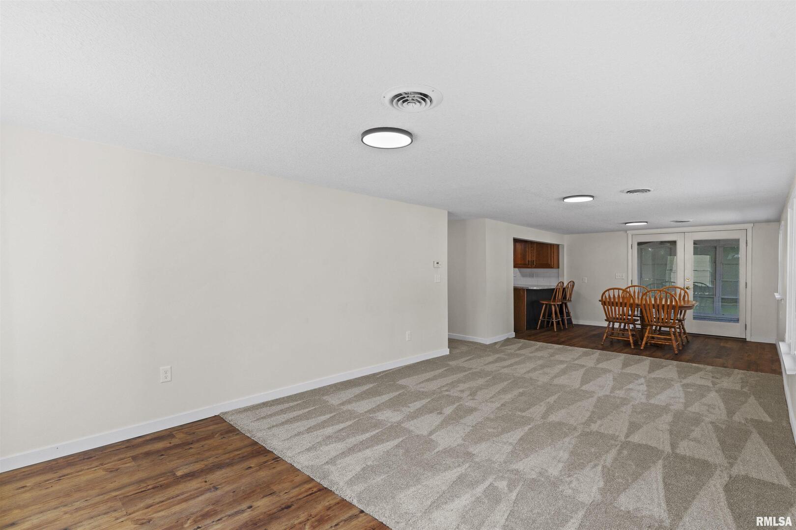 1501 43rd Street Moline, IL 61265 - Photo 21 of 27 a view of livingroom with furniture and a chair