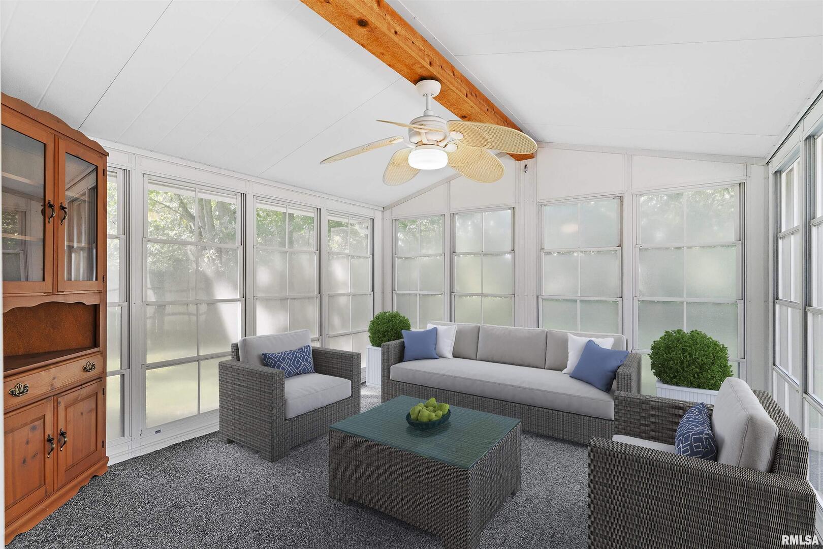 1501 43rd Street Moline, IL 61265 - Photo 7 of 27 a living room with furniture and a floor to ceiling window