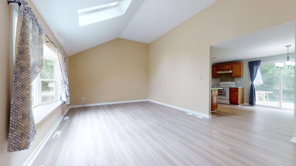 1 Friendly Road Forestdale, MA 02644 - Photo 8 of 38 an empty room with wooden floor and a window