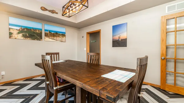 a bathroom with a sink a vanity and a window