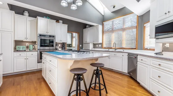 a bedroom with a bed and furniture