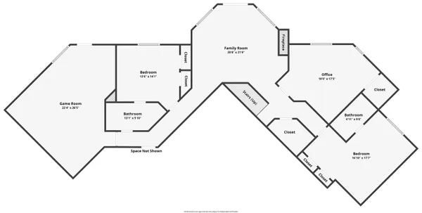 a living room with furniture a fireplace and a large window