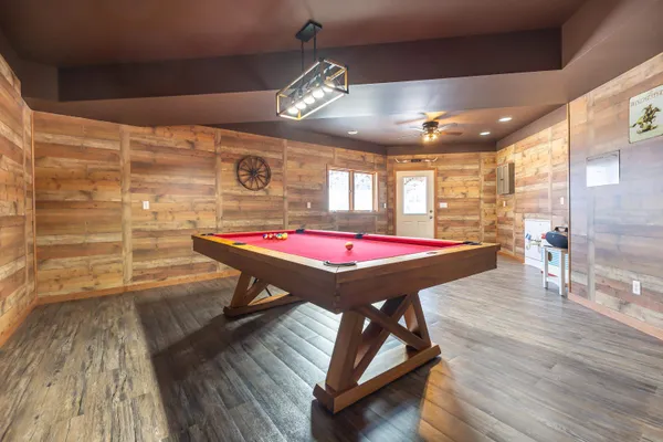 a view of a livingroom with wooden floor