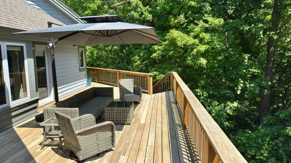 a kitchen with cabinets appliances and a window