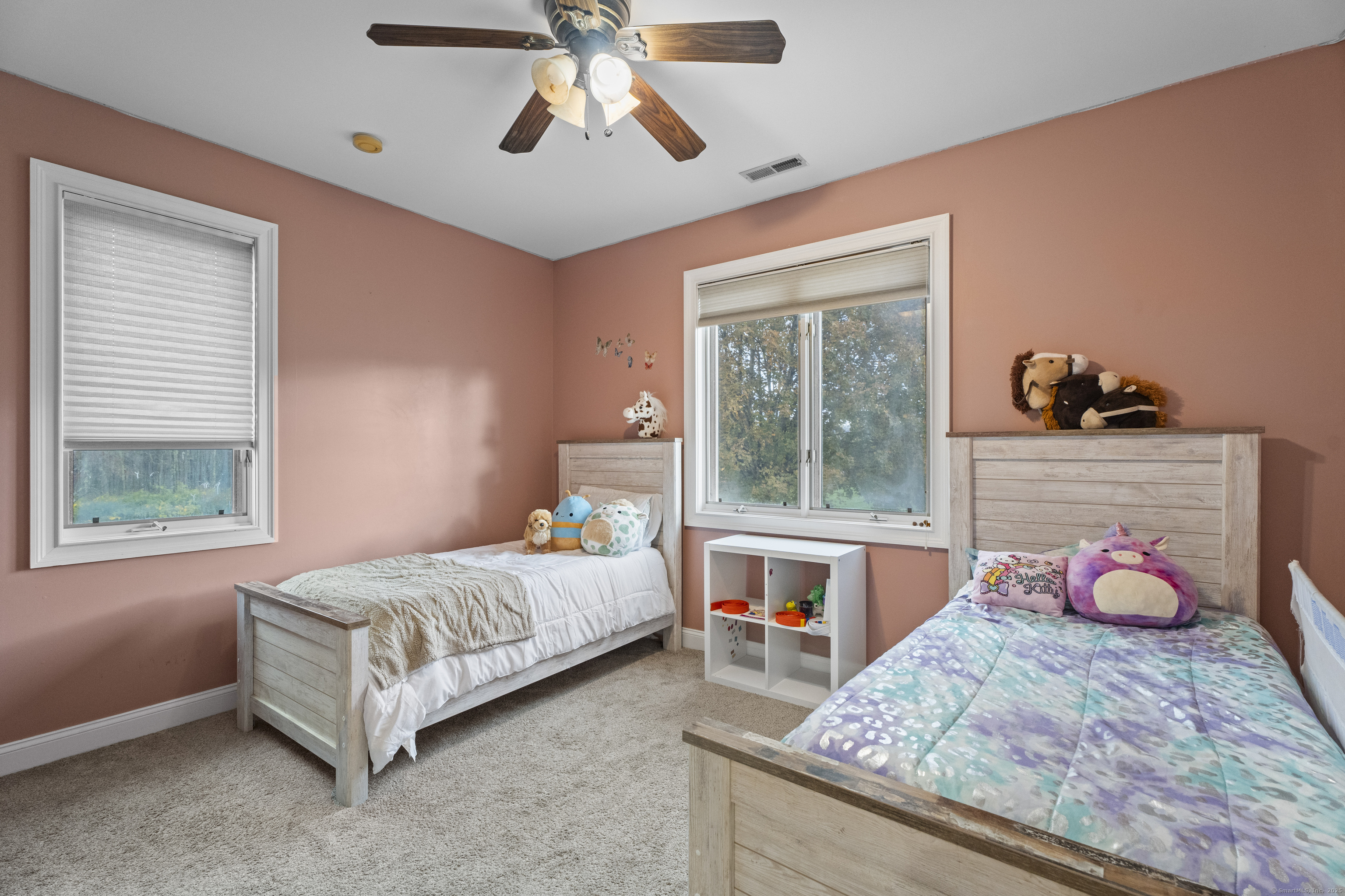 305 Killorin Road Watertown, CT 06795 - Photo 22 of 40 a bedroom with a bed and a window