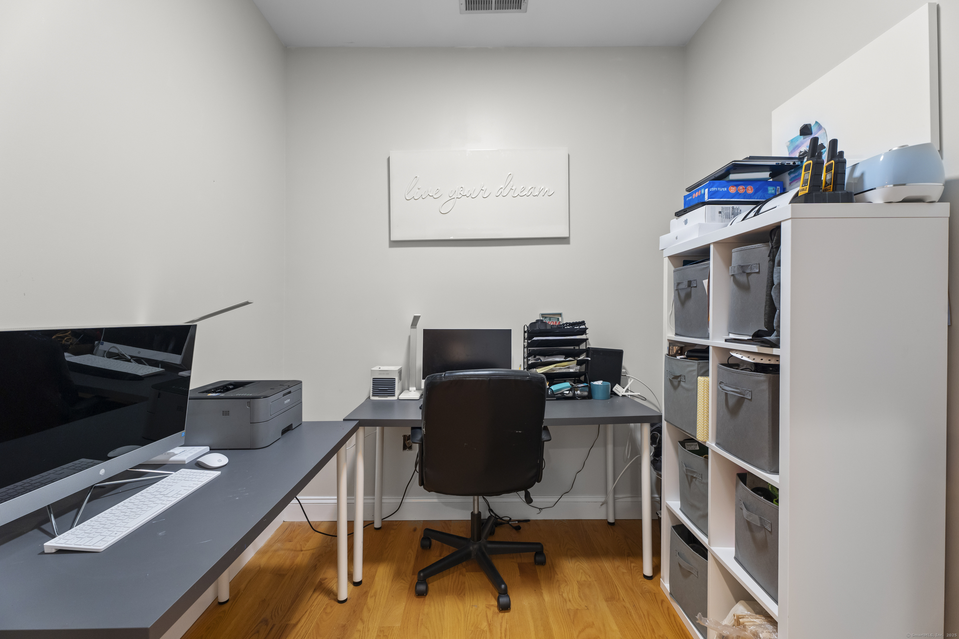 305 Killorin Road Watertown, CT 06795 - Photo 24 of 40 a view of a workspace with furniture and wooden floor