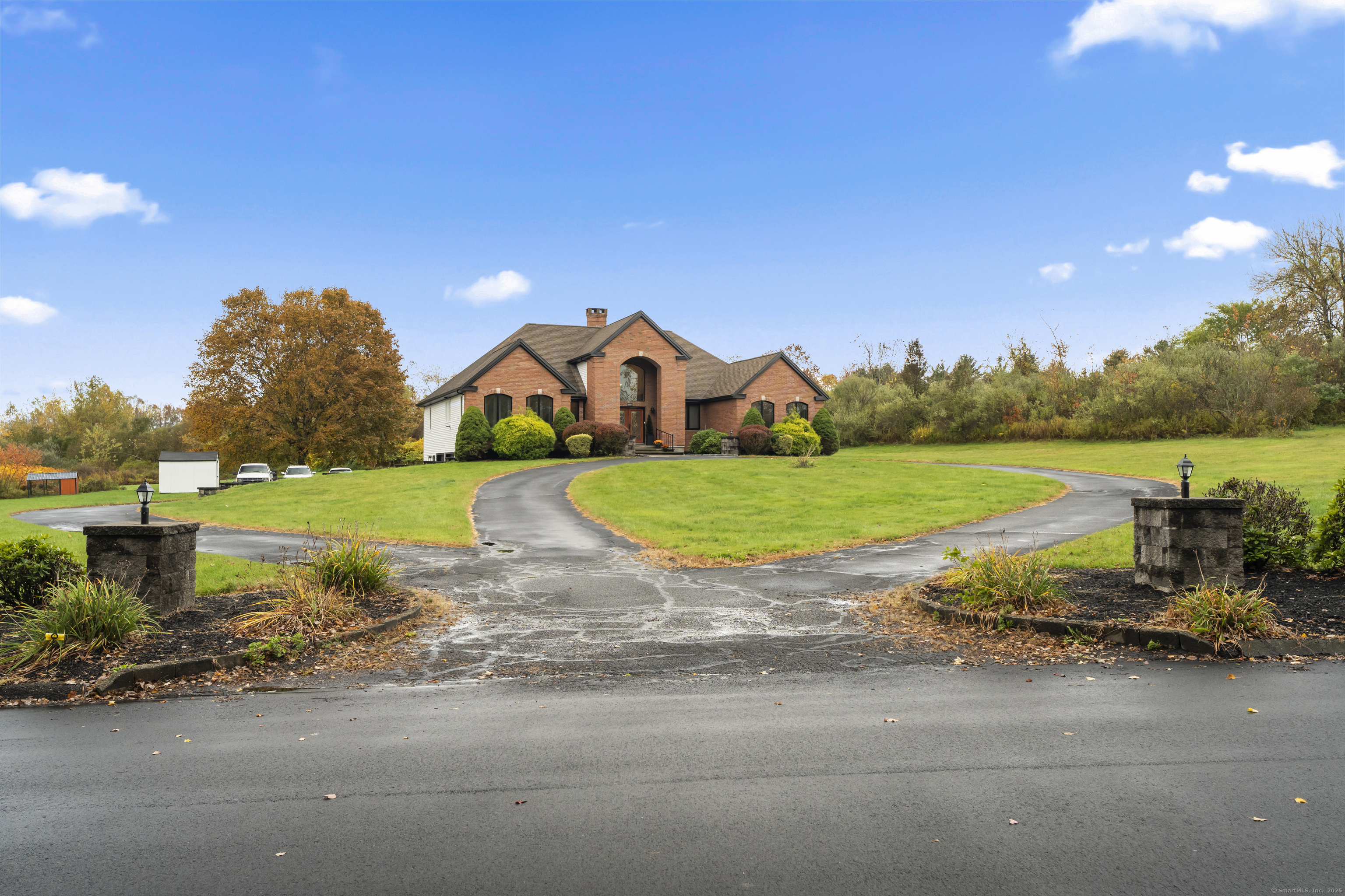 305 Killorin Road Watertown, CT 06795 - Photo 36 of 40 a view of a house with a big yard and large trees