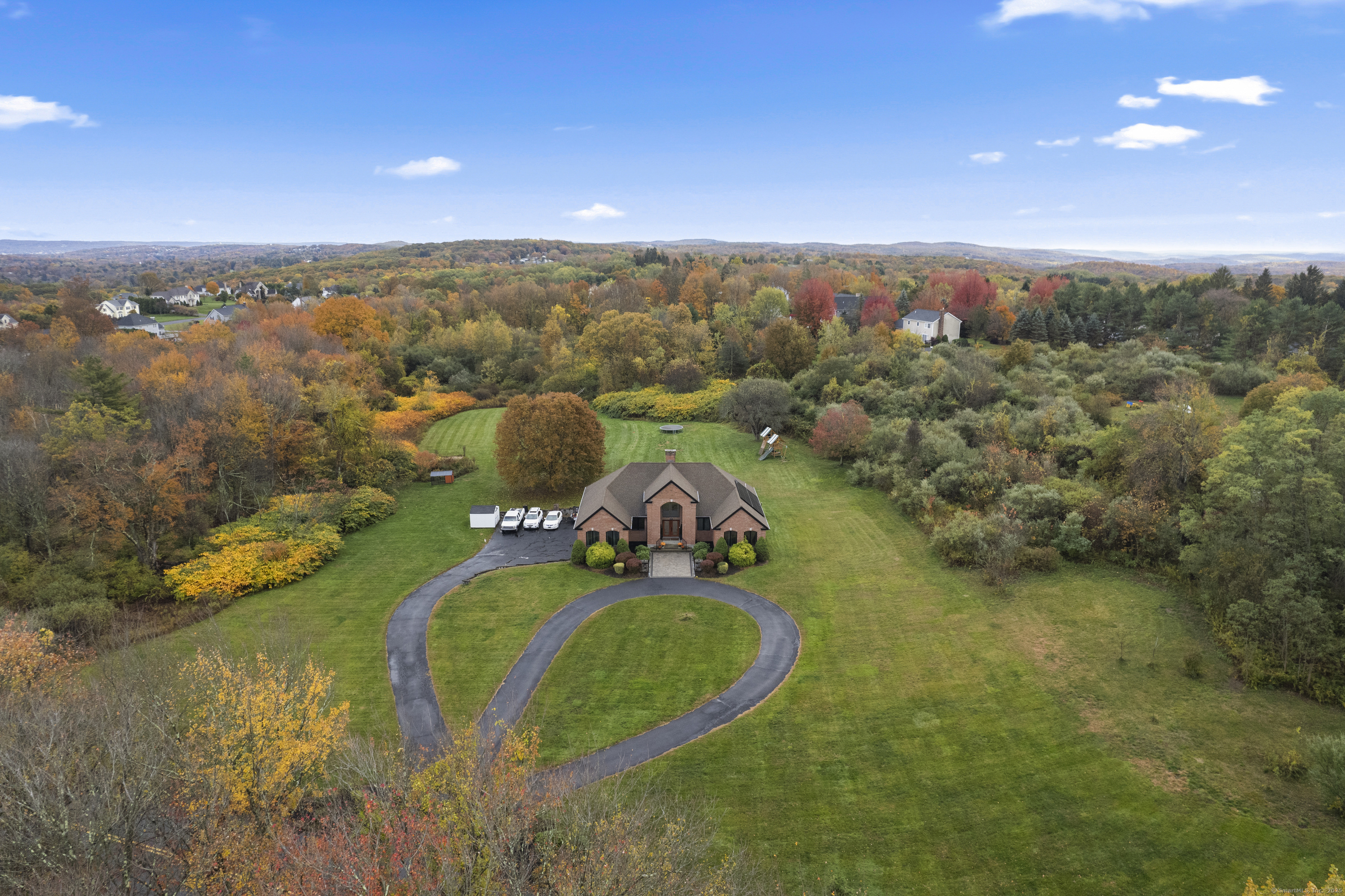 305 Killorin Road Watertown, CT 06795 - Photo 4 of 40 an aerial view of a house with a yard and lake view