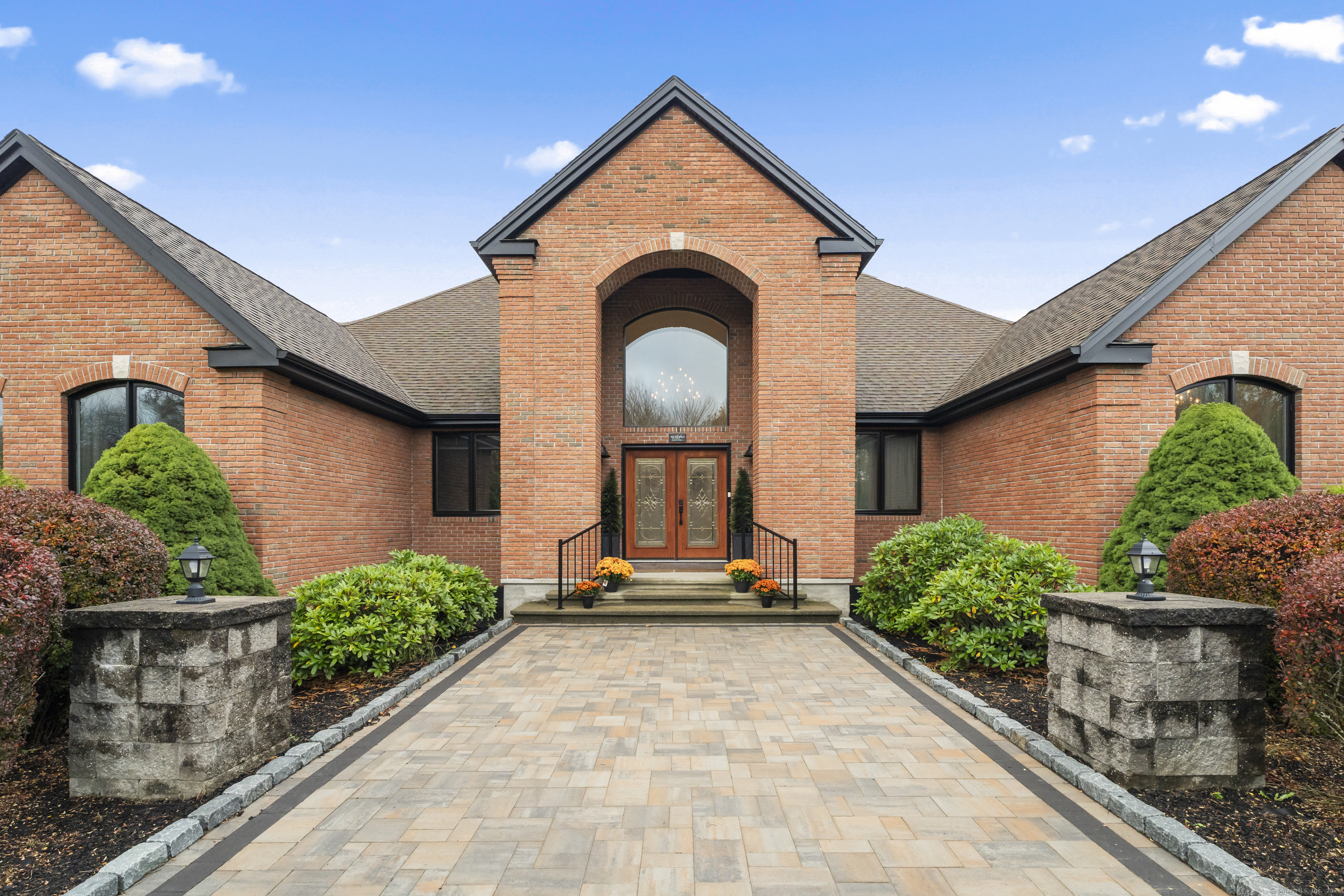 305 Killorin Road Watertown, CT 06795 - Photo 5 of 40 a view of a brick house with potted plants