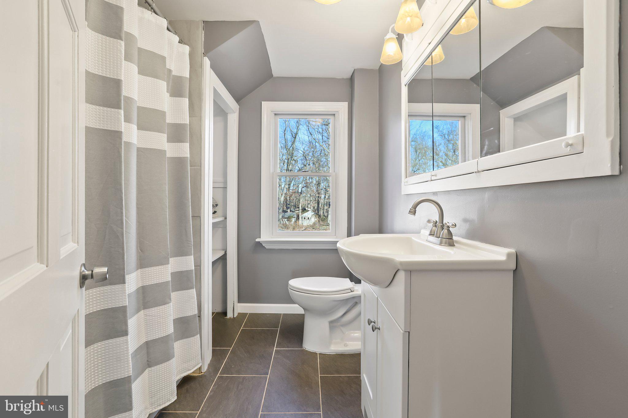 592 Chatsworth Road Tabernacle, NJ 08088 - Photo 29 of 32 a bathroom with a sink toilet and shower