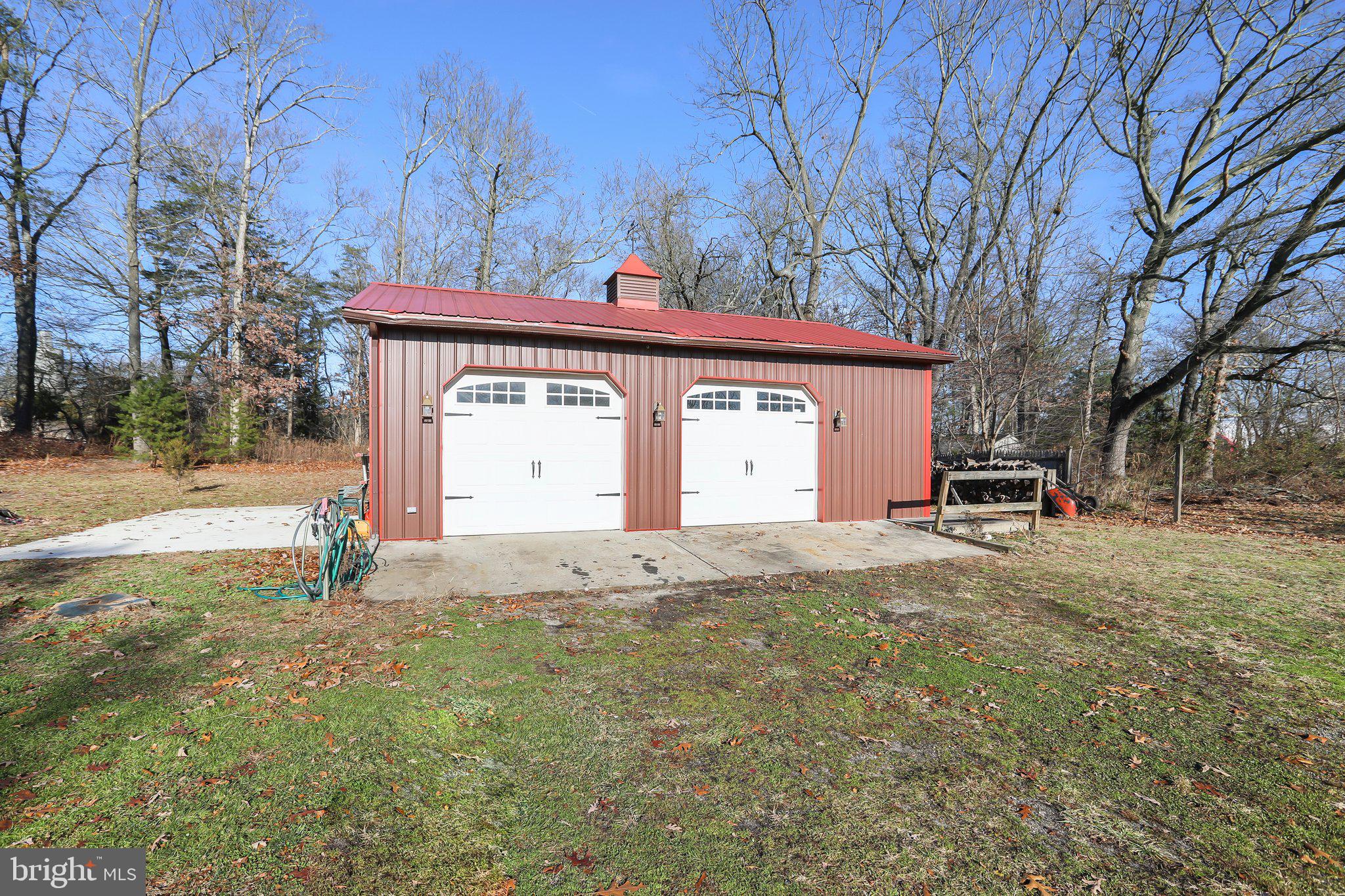 592 Chatsworth Road Tabernacle, NJ 08088 - Photo 5 of 32 a front view of a house with a yard