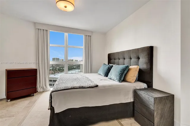 a view of a swimming pool and lounge chair