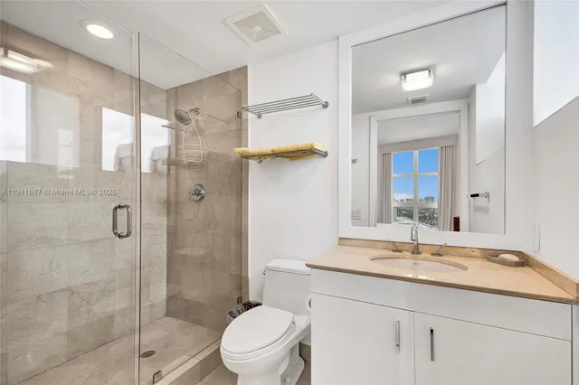 a view of a city with tall buildings