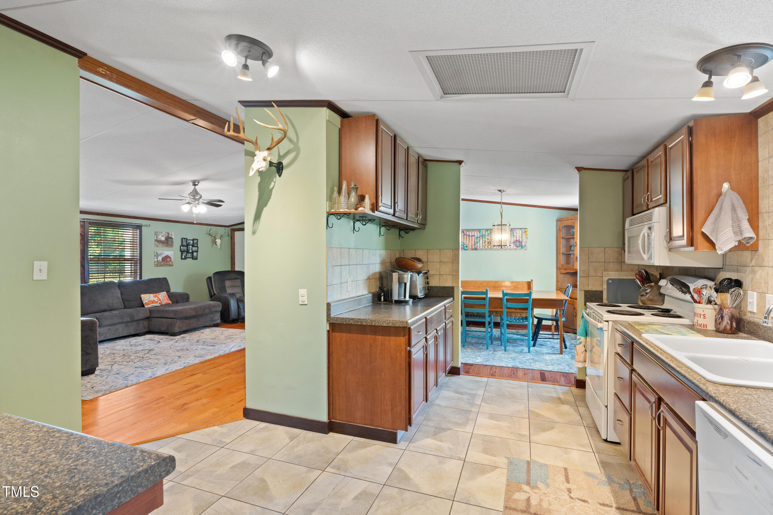 337 Horne Estate Road Carthage, NC 28327 - Photo 11 of 51 a view of a kitchen with furniture and a kitchen