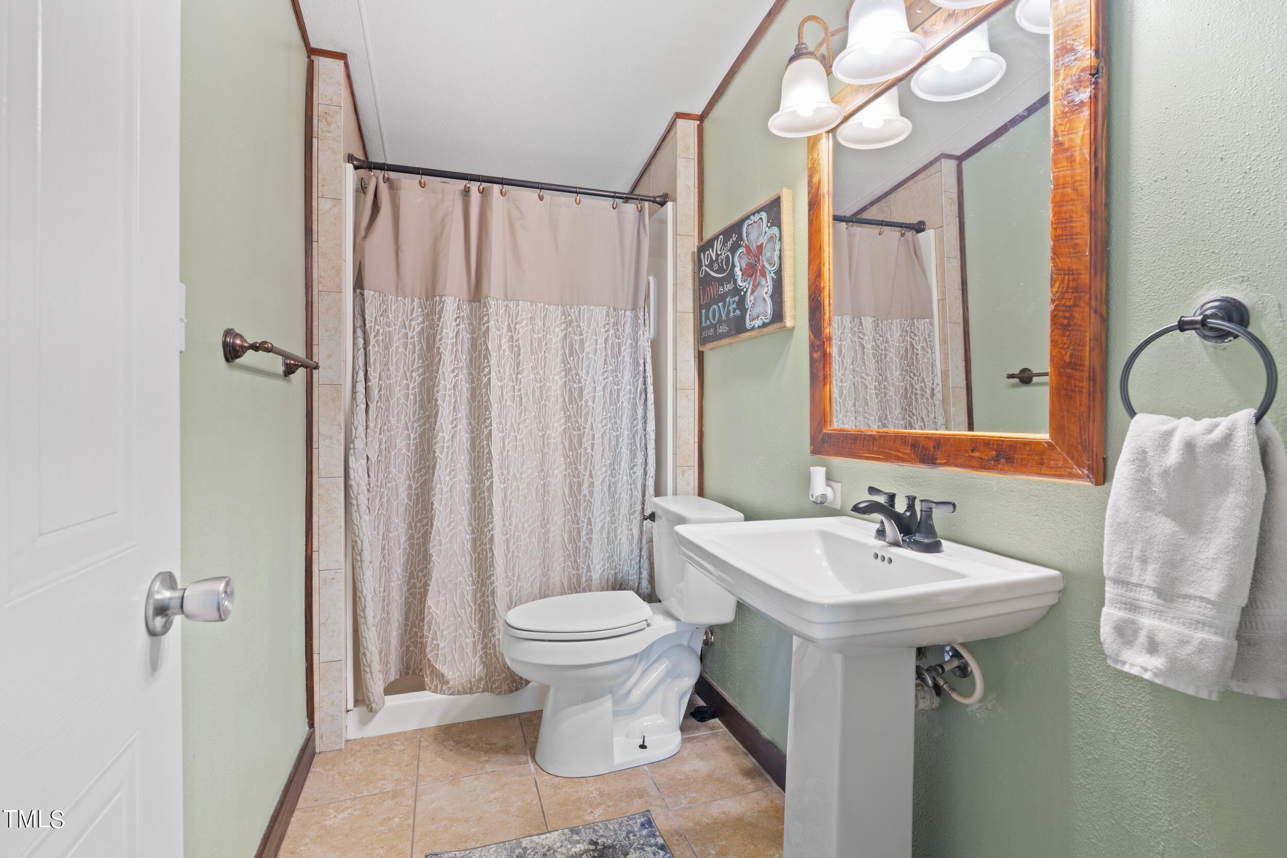 337 Horne Estate Road Carthage, NC 28327 - Photo 19 of 51 a bathroom with a sink toilet and shower