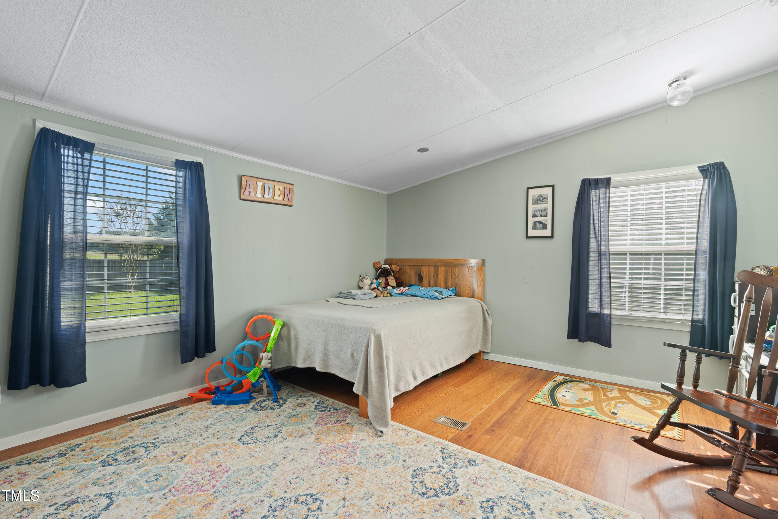 337 Horne Estate Road Carthage, NC 28327 - Photo 22 of 51 a bedroom with a bed and a window