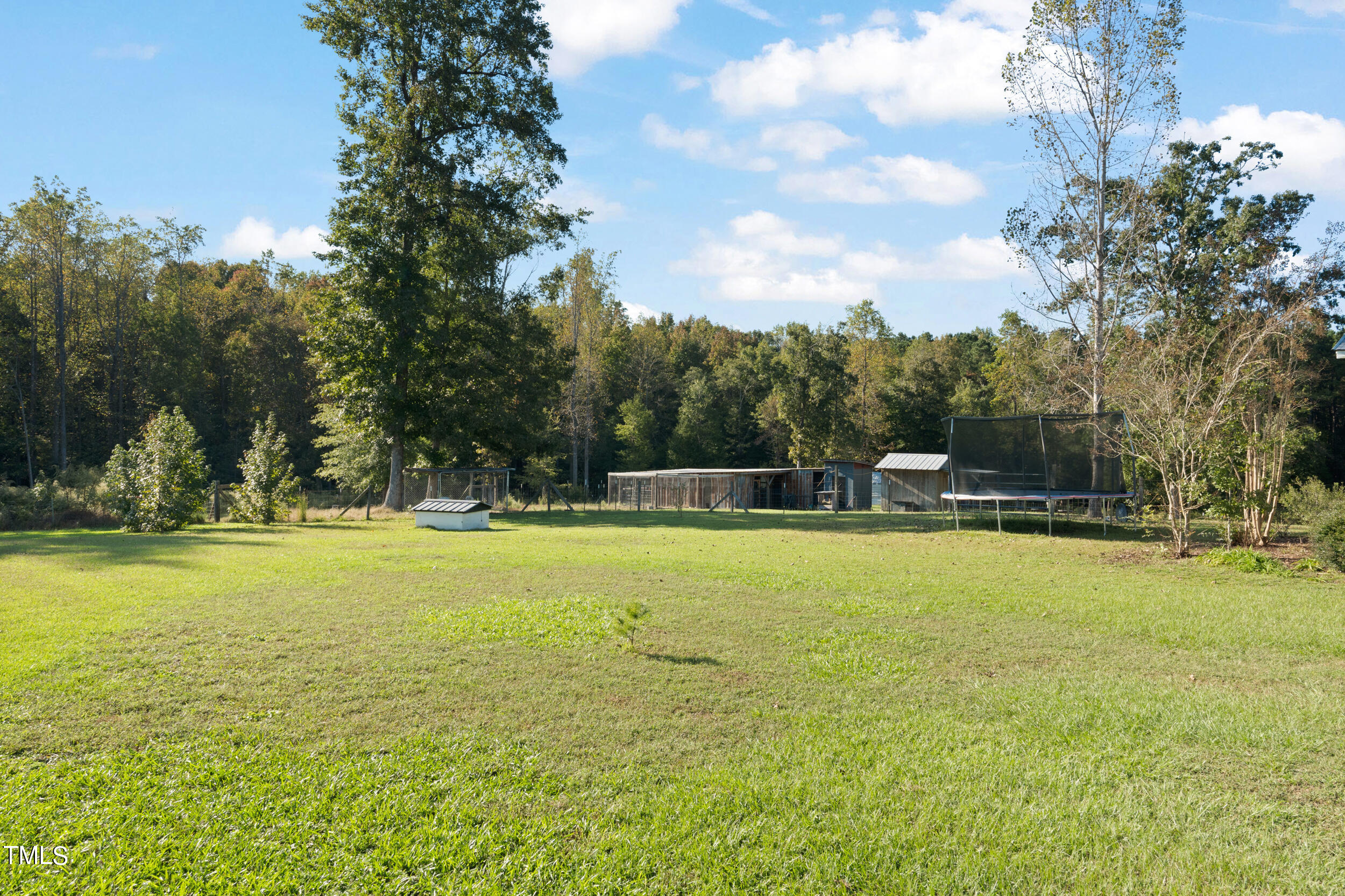 337 Horne Estate Road Carthage, NC 28327 - Photo 24 of 51 a view of a swimming pool with an outdoor seating and a yard