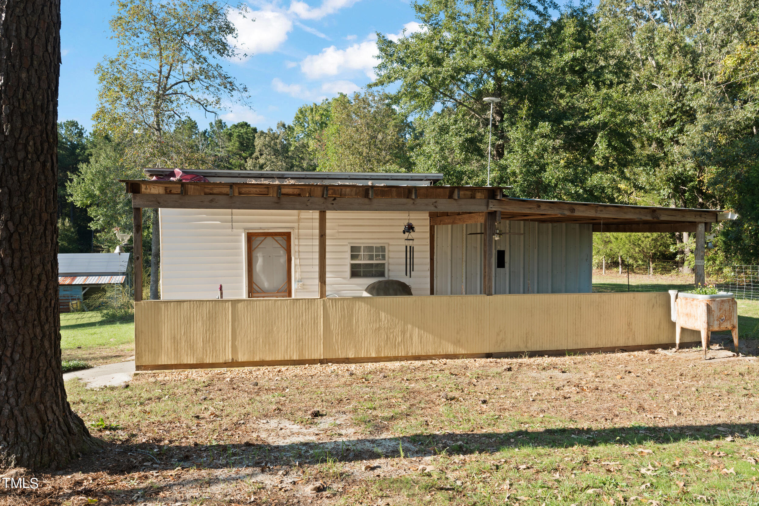 337 Horne Estate Road Carthage, NC 28327 - Photo 32 of 51 a view of a house with a yard