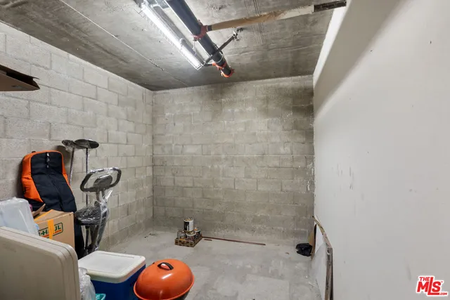 a bathroom with a toilet and shower