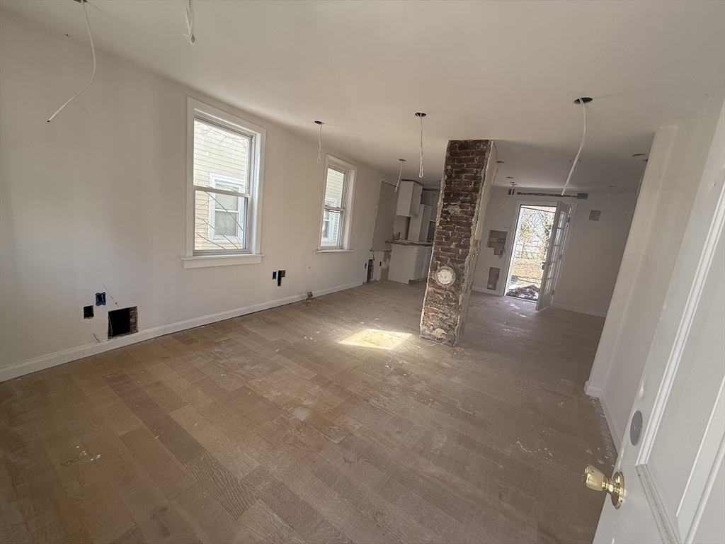 28 Angell Street Mansfield, MA 02048 - Photo 14 of 17 a view of an empty room with a window