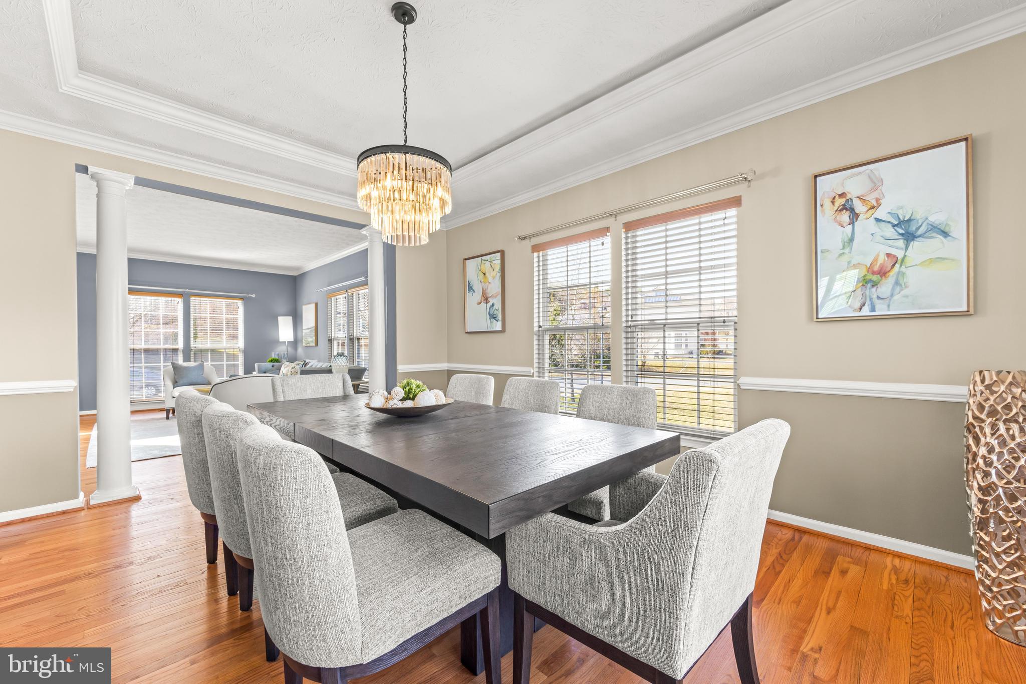 1717 Maco Drive Hanover, MD 21076 - Photo 26 of 93 a view of a dining room with furniture wooden floor and chandelier