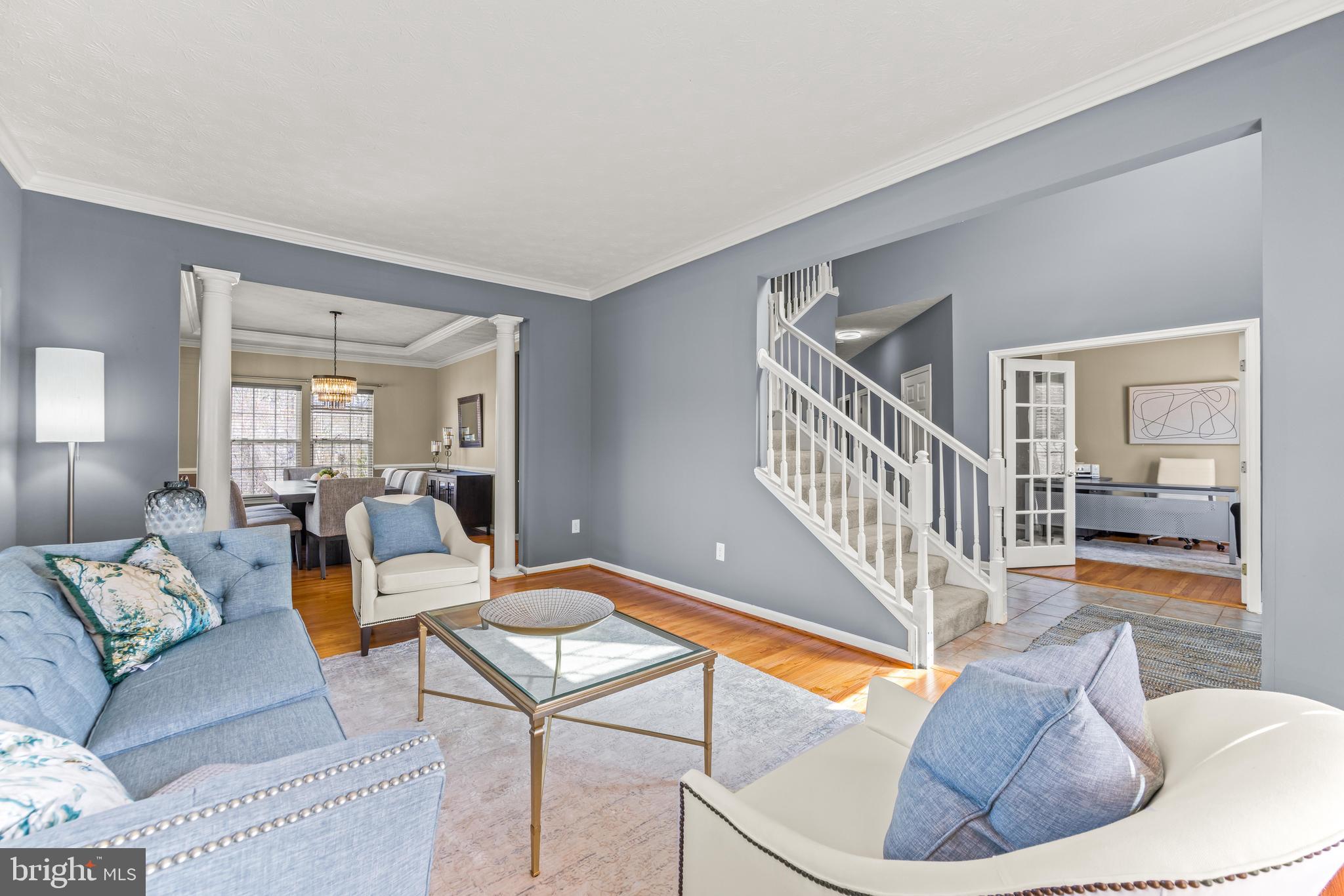 1717 Maco Drive Hanover, MD 21076 - Photo 29 of 93 a living room with furniture and a dining table