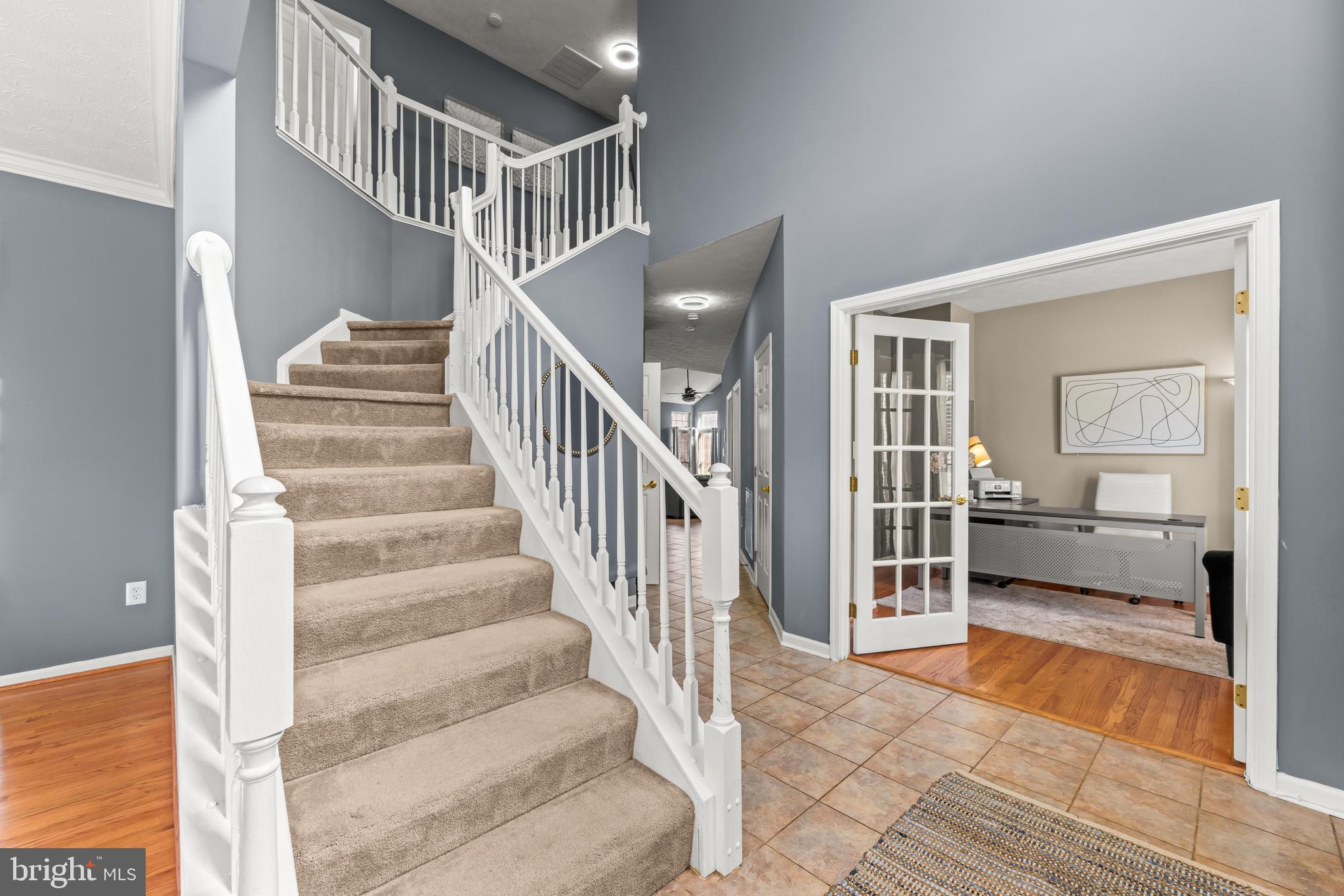 1717 Maco Drive Hanover, MD 21076 - Photo 32 of 93 Curved Staircase to upper level