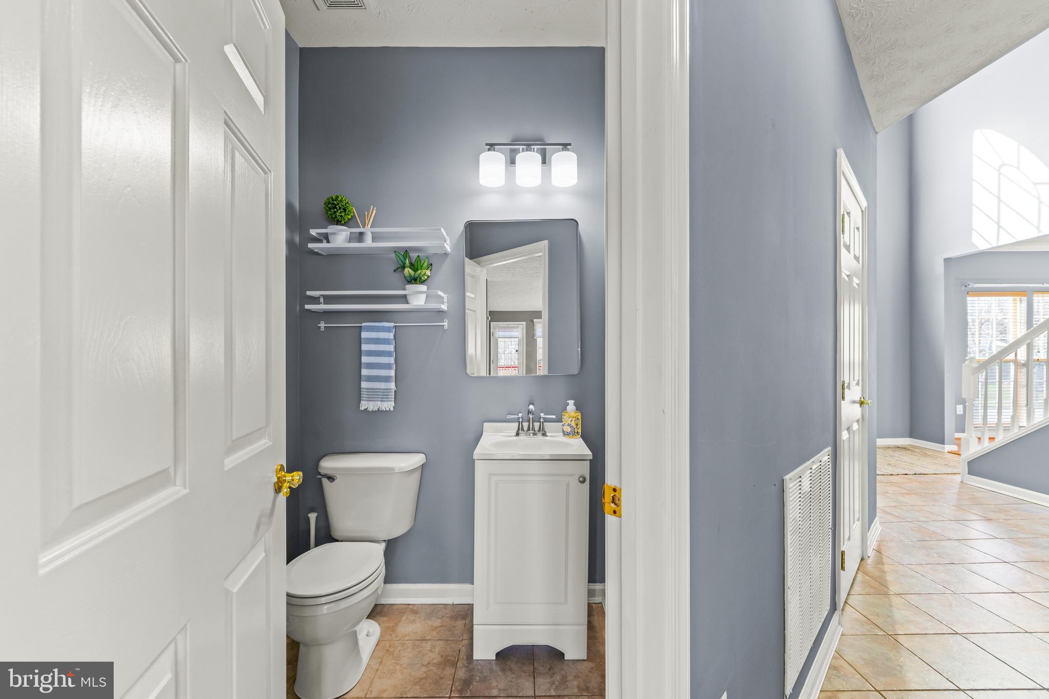 1717 Maco Drive Hanover, MD 21076 - Photo 36 of 93 a bathroom with a sink toilet and window