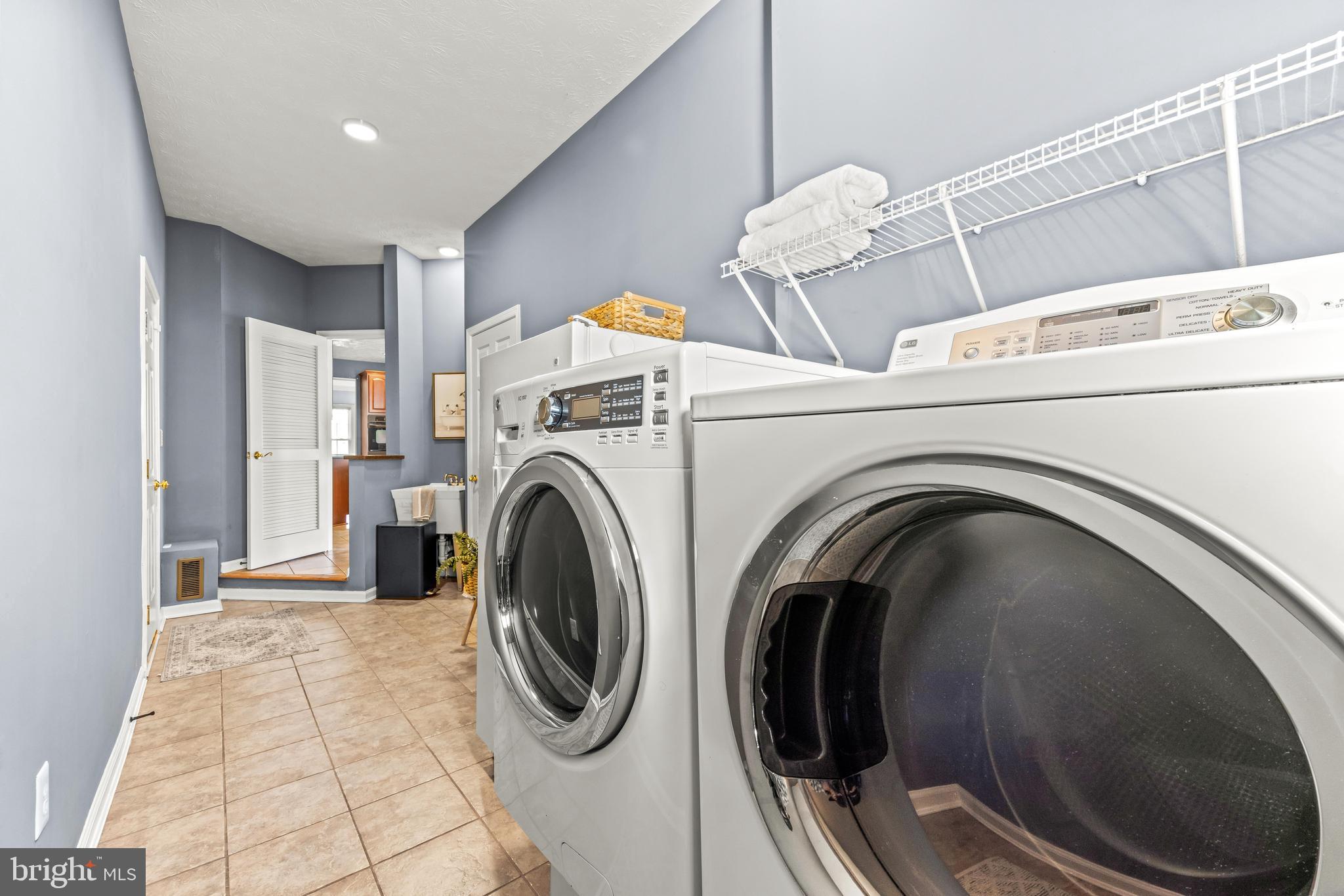 1717 Maco Drive Hanover, MD 21076 - Photo 39 of 93 a utility room with dryer and washer