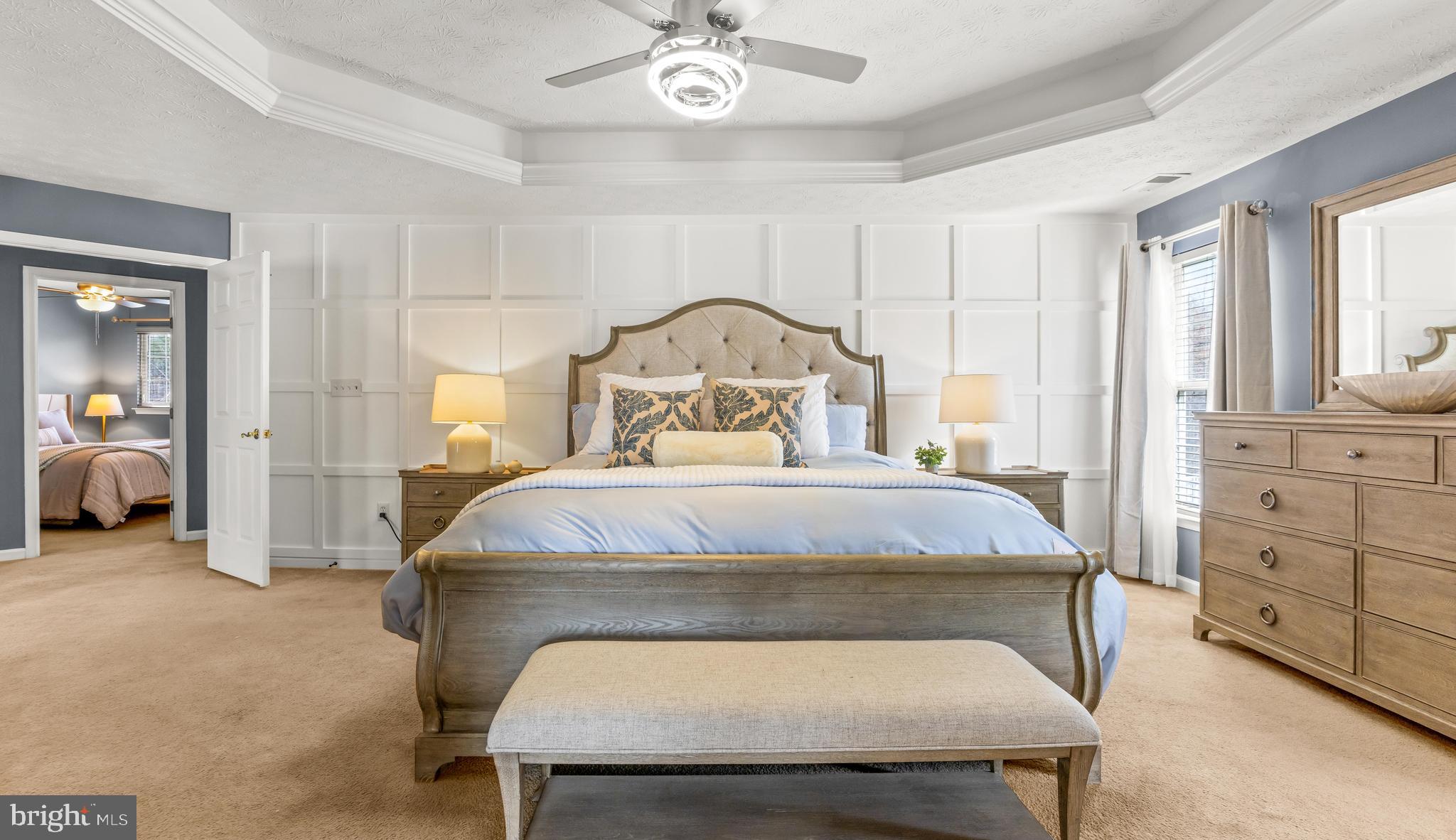 1717 Maco Drive Hanover, MD 21076 - Photo 43 of 93 a bedroom with a bed and a chandelier