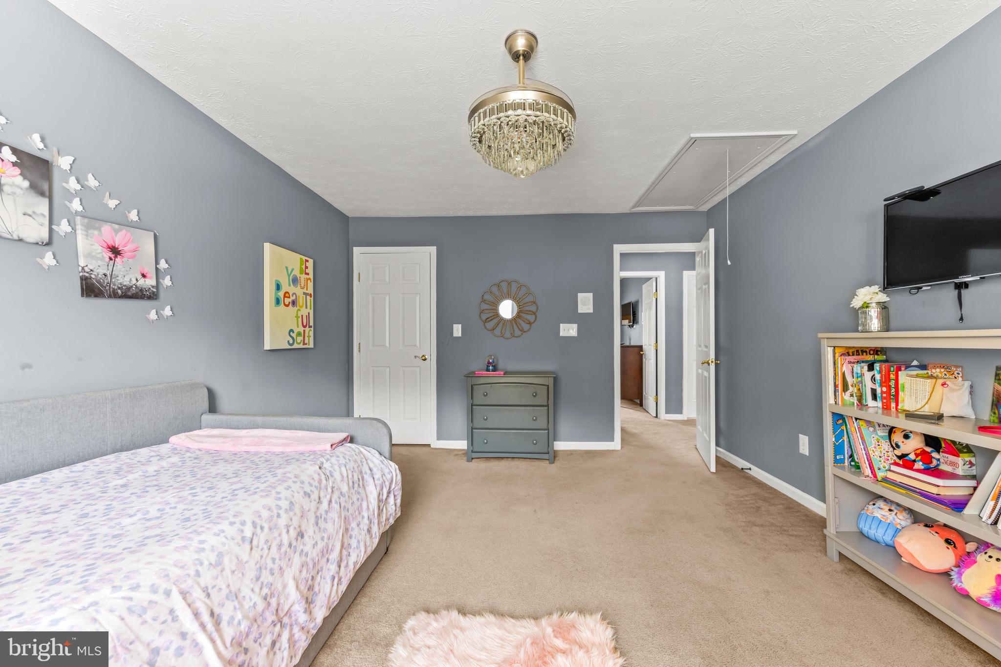 1717 Maco Drive Hanover, MD 21076 - Photo 55 of 93 a bedroom with a bed and a tv in it
