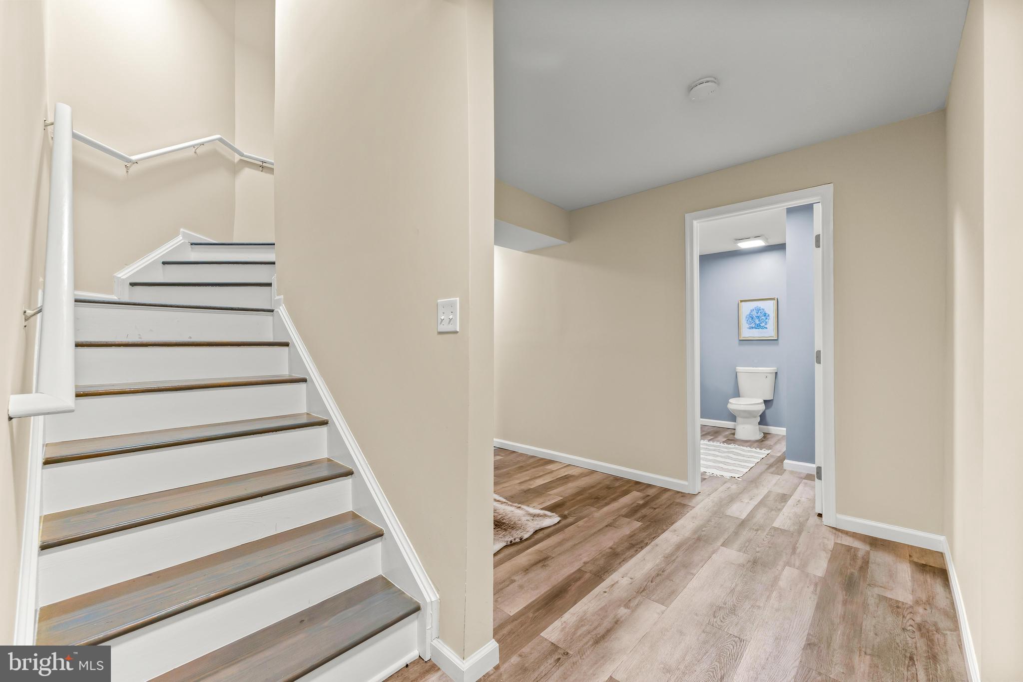 1717 Maco Drive Hanover, MD 21076 - Photo 62 of 93 a view of a hallway with wooden floor and entryway