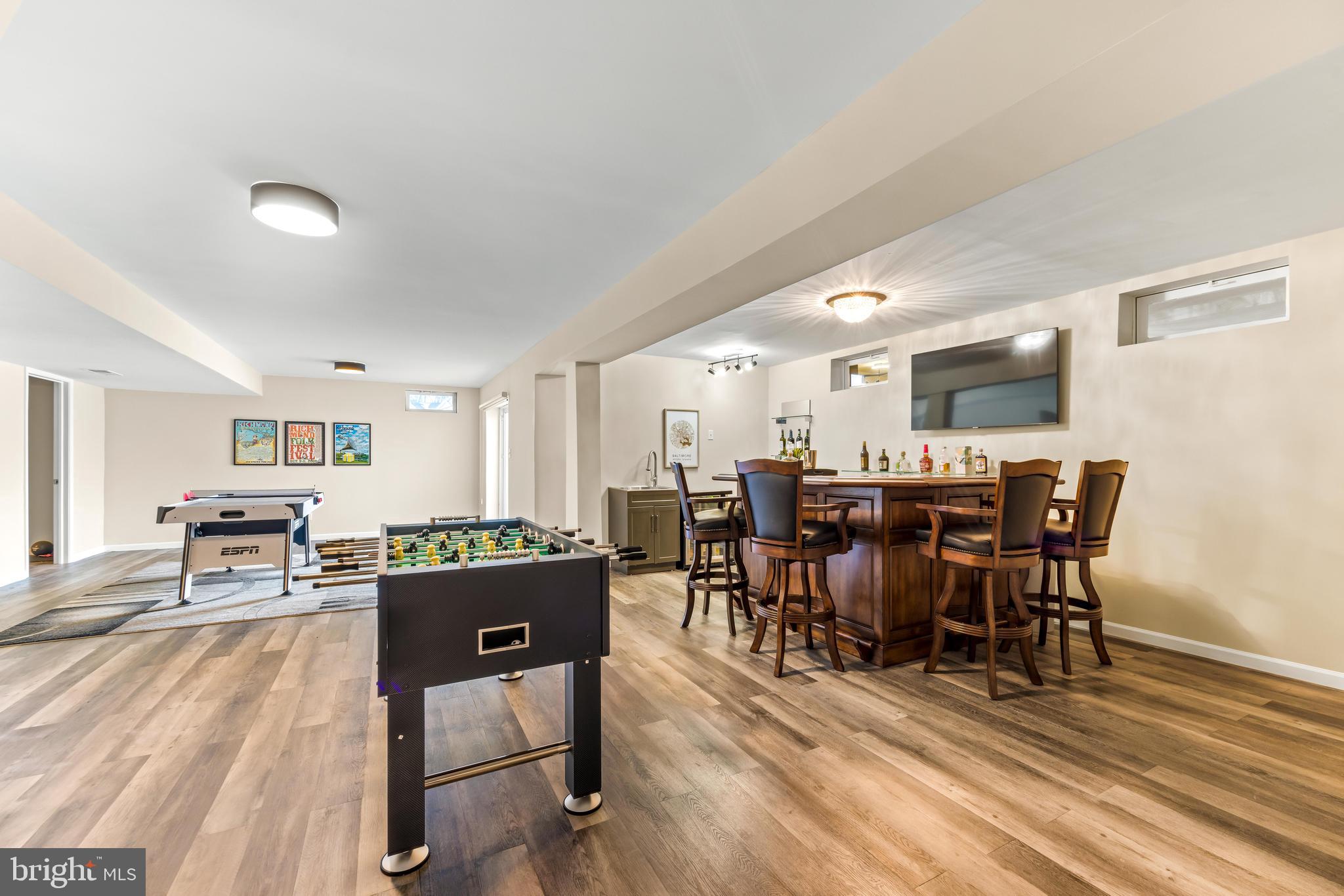 1717 Maco Drive Hanover, MD 21076 - Photo 67 of 93 a view of a dining room with furniture and wooden floor